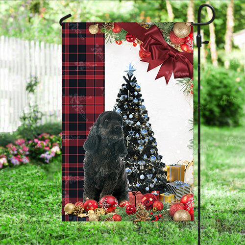 Black Cocker Spaniel Flag Sitting In Front Of The Christmas Tree