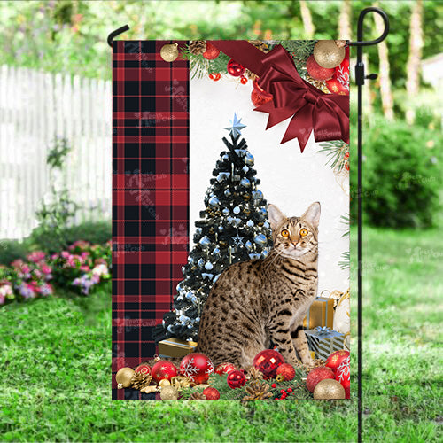 Savannah Cat Flag Sitting In Front Of The Christmas Tree