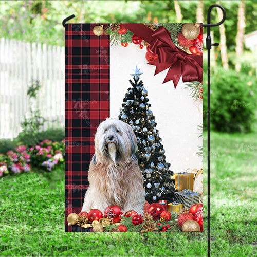 Tibetan Terrier Flag Sitting In Front Of The Christmas Tree