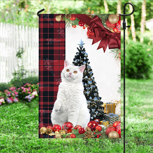 Selkirk Rex Cat Flag Sitting In Front Of The Christmas Tree