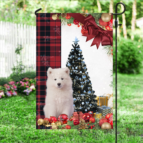 Samoyed Flag Sitting In Front Of The Christmas Tree