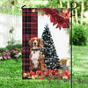 Sprocker Flag Sitting In Front Of The Christmas Tree