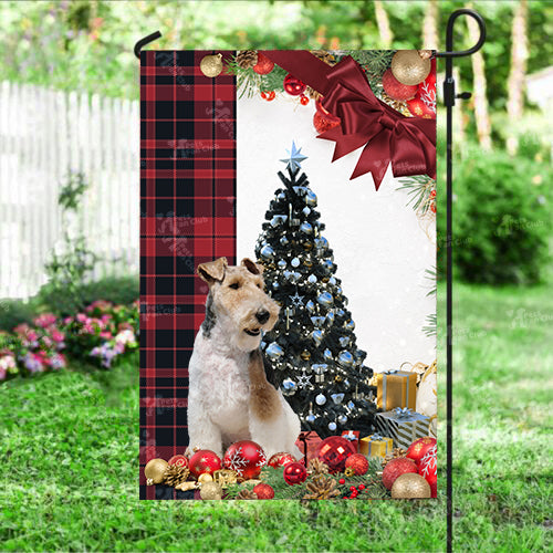 Fox Terrier Flag Sitting In Front Of The Christmas Tree