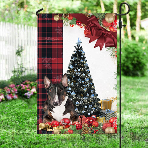 English Bull Terrier Flag Sitting In Front Of The Christmas Tree