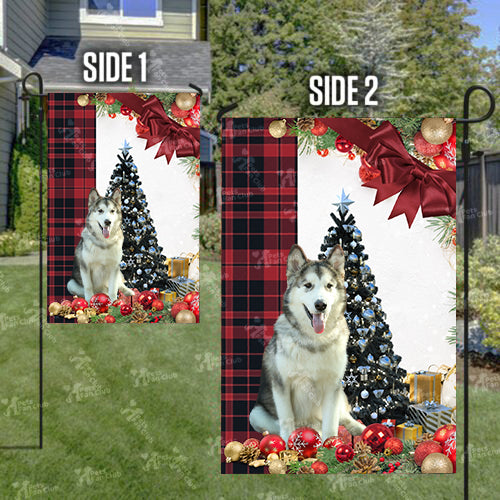 Alaskan Malamute Flag Sitting In Front Of The Christmas Tree