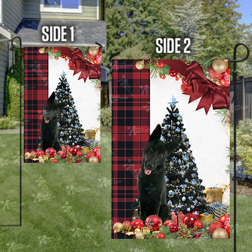 Black German Shepherd Flag Sitting In Front Of The Christmas Tree