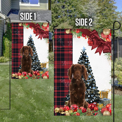 Working Cocker Spaniel Flag Sitting In Front Of The Christmas Tree