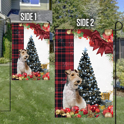 Fox Terrier Flag Sitting In Front Of The Christmas Tree