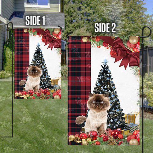 Himalayan Cat Flag Sitting In Front Of The Christmas Tree