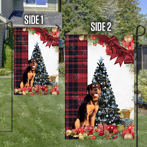 Rottweiler Flag Sitting In Front Of The Christmas Tree