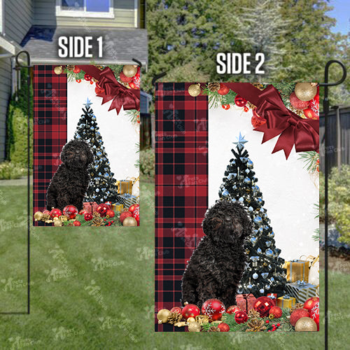 Black Poodle Flag Sitting In Front Of The Christmas Tree