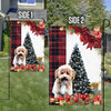 Poochon Flag Sitting In Front Of The Christmas Tree