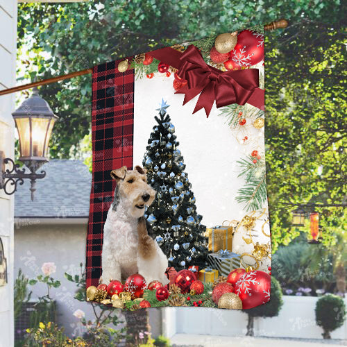 Fox Terrier Flag Sitting In Front Of The Christmas Tree