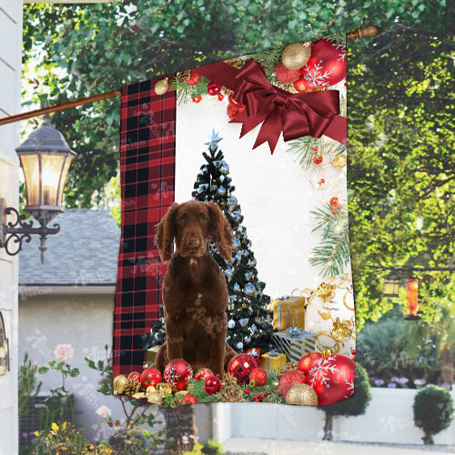 Working Cocker Spaniel Flag Sitting In Front Of The Christmas Tree