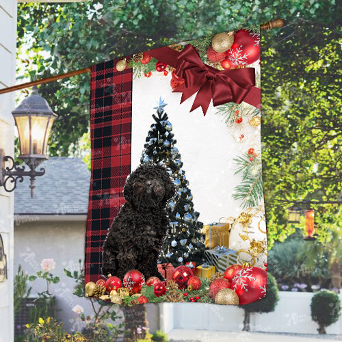 Black Poodle Flag Sitting In Front Of The Christmas Tree