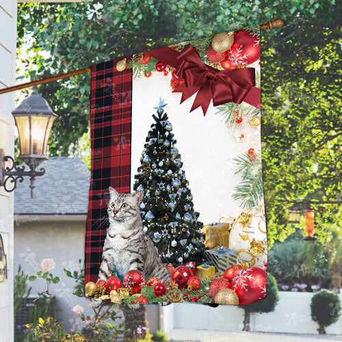 Egyptian Mau Cat Flag Sitting In Front Of The Christmas Tree