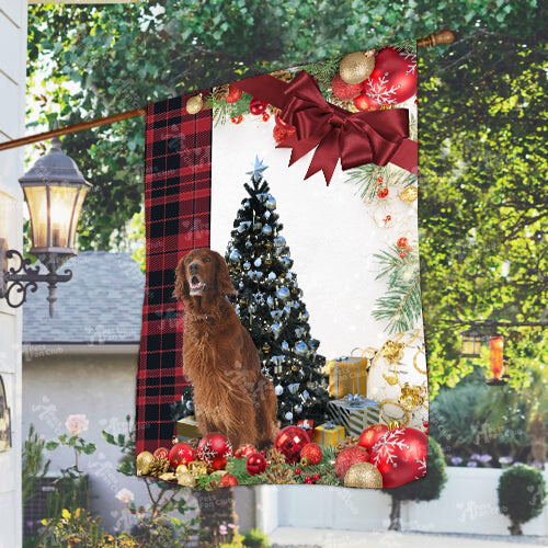 Red Setter Flag Sitting In Front Of The Christmas Tree