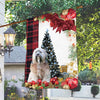 Tibetan Terrier Flag Sitting In Front Of The Christmas Tree