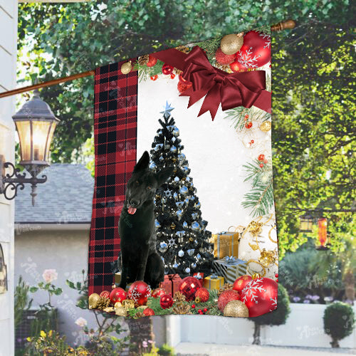 Black German Shepherd Flag Sitting In Front Of The Christmas Tree