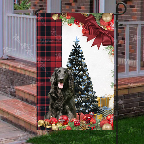 Flat Coat Retriever Flag Sitting In Front Of The Christmas Tree