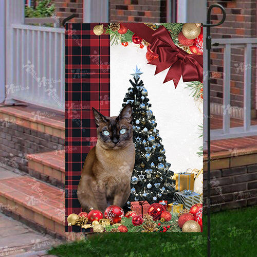 Tonkinese Cat Flag Sitting In Front Of The Christmas Tree