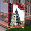 Alaskan Malamute Flag Sitting In Front Of The Christmas Tree