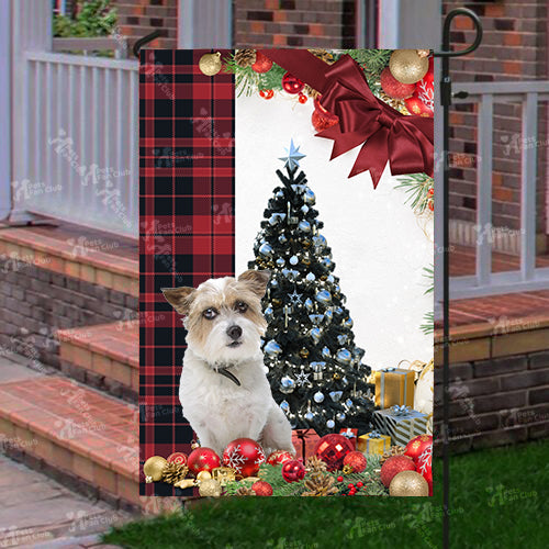 Jackapoo Flag Sitting In Front Of The Christmas Tree