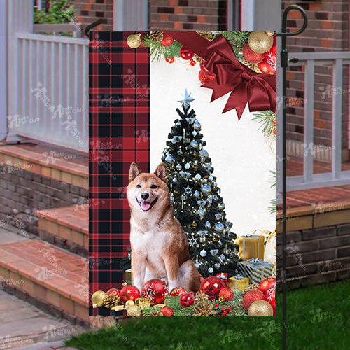 Shiba Inu Flag Sitting In Front Of The Christmas Tree