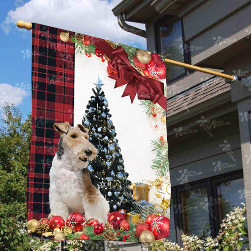 Fox Terrier Flag Sitting In Front Of The Christmas Tree