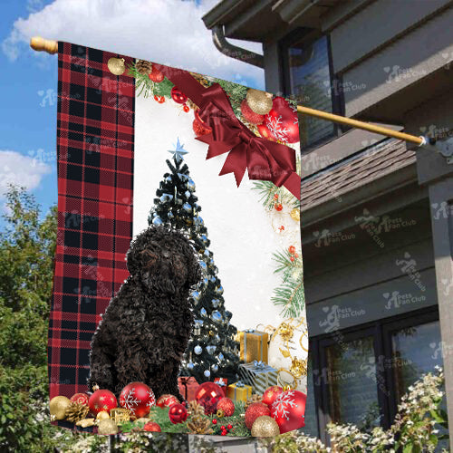 Black Poodle Flag Sitting In Front Of The Christmas Tree